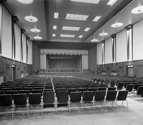 An old archival photo of the Hornsey Town Hall performance stage.