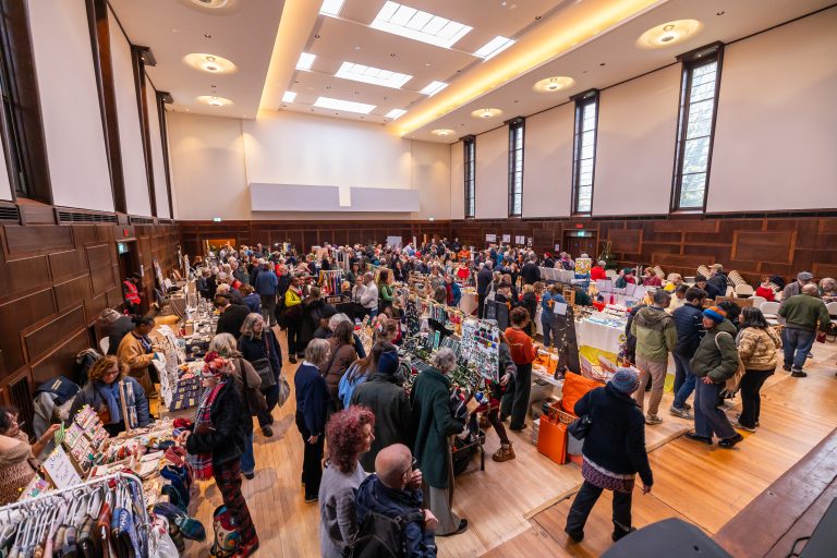 The Assembly Hall at Hornsey Town Hall full of people during a festive market.